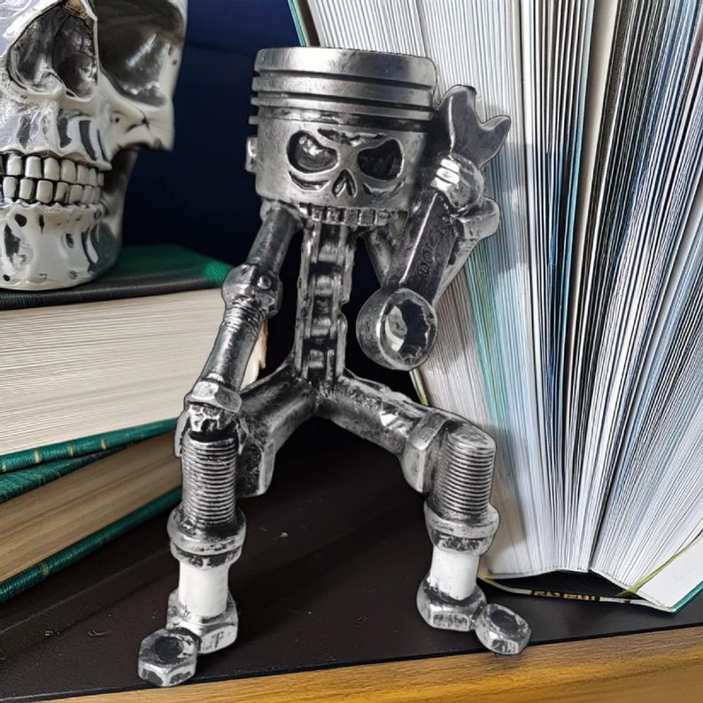 Piston Skull Resin Sculpture with Wrench Legs: Industrial Tabletop Decor for Car Enthusiasts